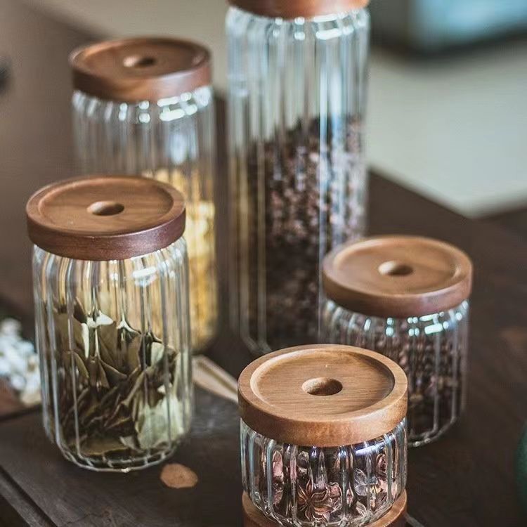 Sealed jar with striped acacia wood lid