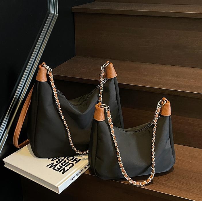 Bolso de axila simple de comercio exterior femenino 2025 nueva versión coreana de la bolsa de mensajero de viaje de trabajo bolso de alta capacidad de ocio