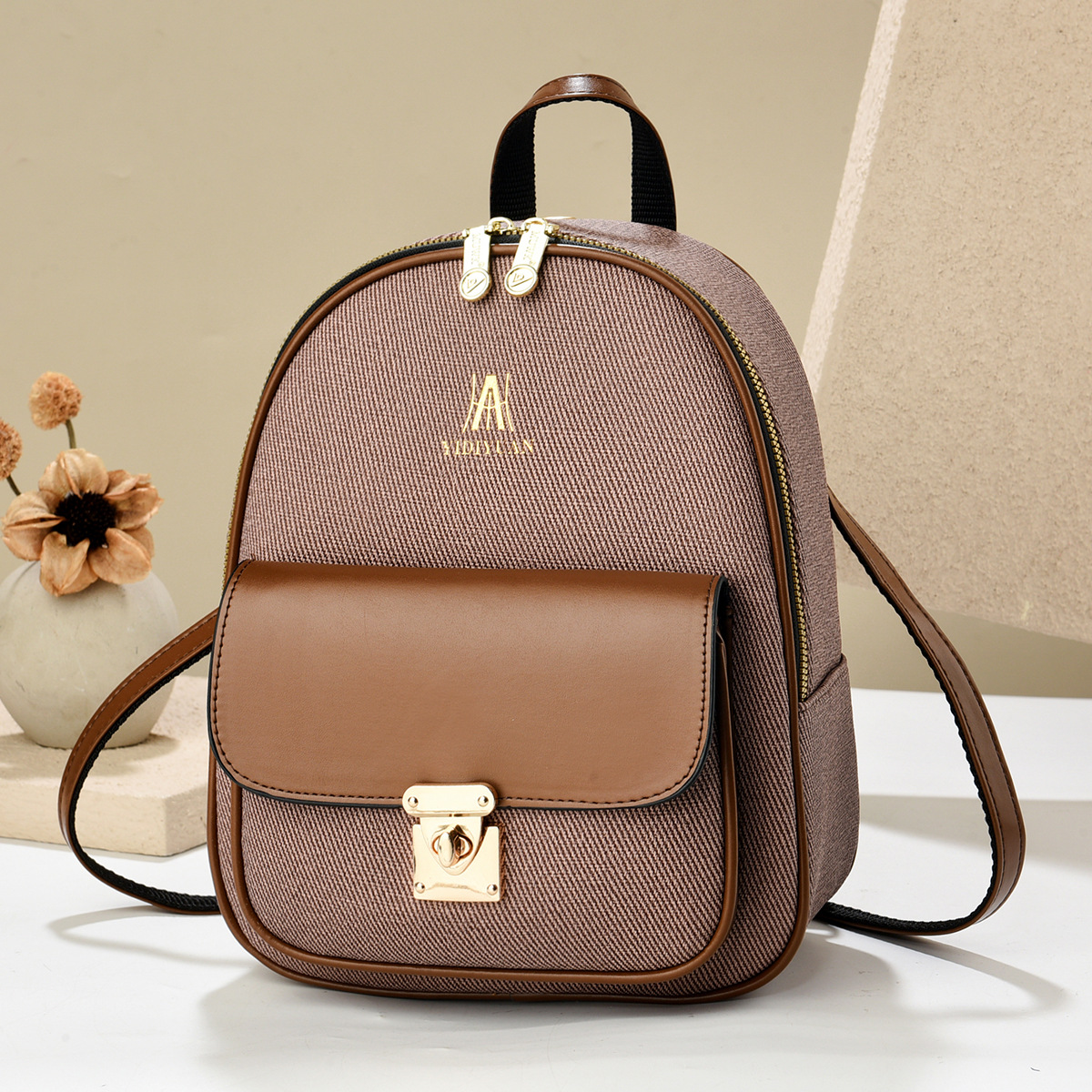 Mochila de color sólido, nuevo estilo 2025, elegante bolso de mujer, mochila escolar informal, mochila de viaje de doble uso, bolsos de exportación
