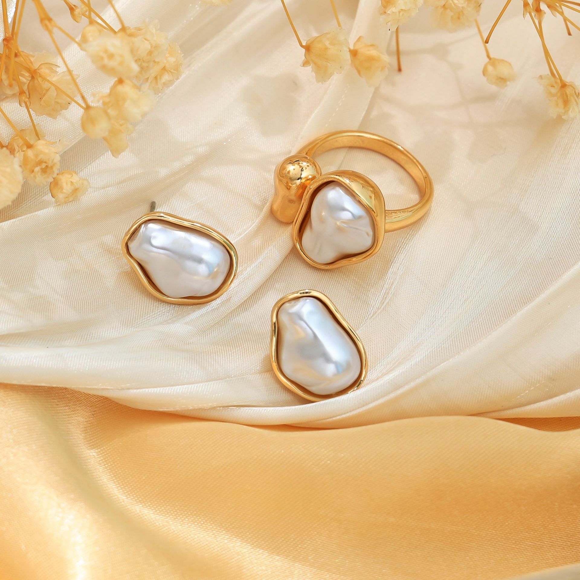 Venta caliente transfronteriza europea y americana, conjunto de anillos de collar, pendientes de moda de perlas del sexo opuesto, pendientes de mujer de alta calidad