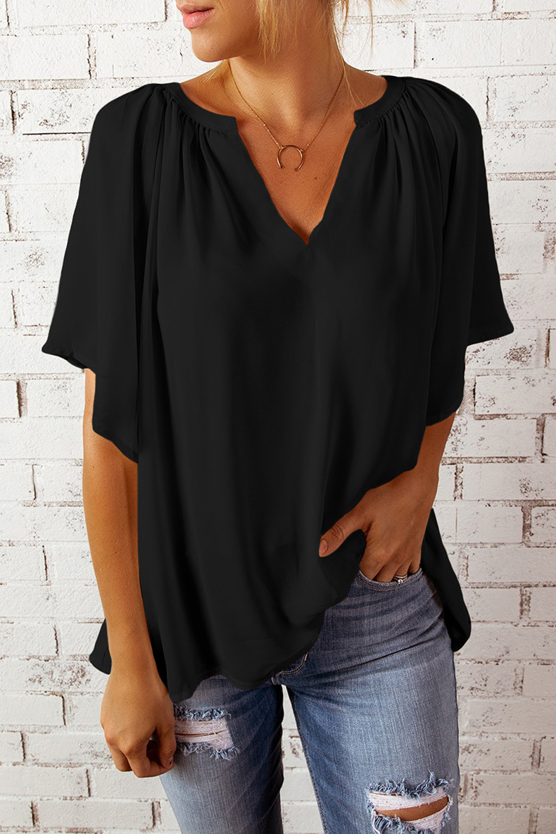 top holgado de color sólido con cuello en V y manga de cinco puntos NSQSY129321