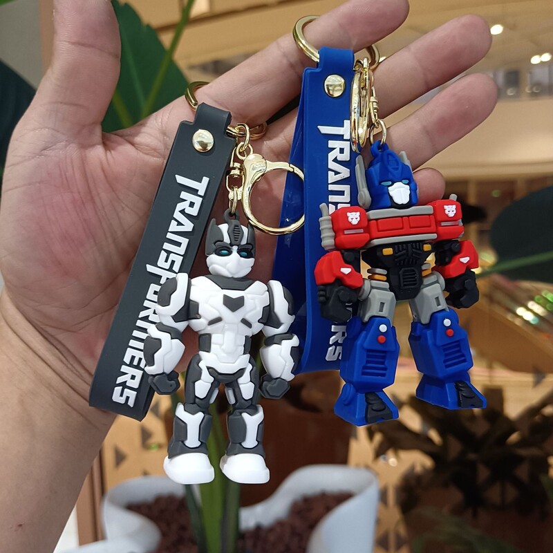 Cartoon transformer keychain Optimus Prime bumblebee three-dimensional doll car key chain pendant night market wholesale