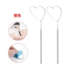 Heart-shaped examination mirror silver