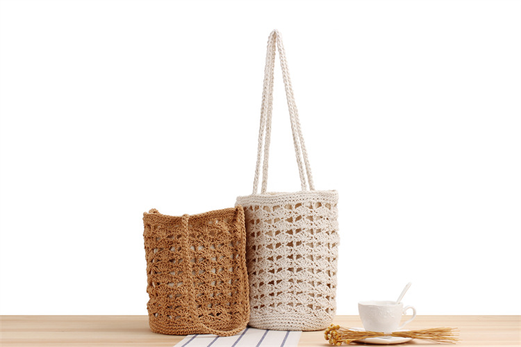 Women's Medium Cotton Rope Solid Color Vacation Beach Weave Bucket String Straw Bag display picture 1