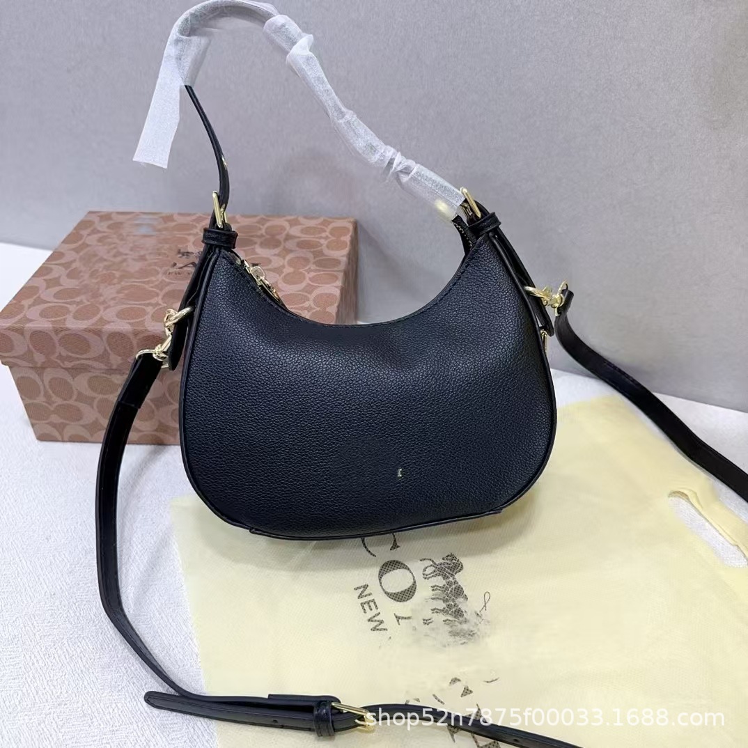 2023新型潮クロスボーダー対外貿易女性バッグ腋の下三日月包復古老花手提げシングル肩斜めショルダーバッグロゴ付き