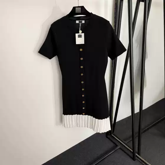 Elegant French-Style Knit Dress with Black and White Contrast Panels and Pleated Hem, Short Sleeve, Waist-Nipped