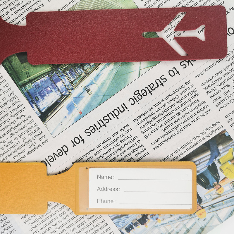 Double-sided leather luggage tag with hollow airplane long strip hot pressed PVC leather boarding pass with paper card luggage tag