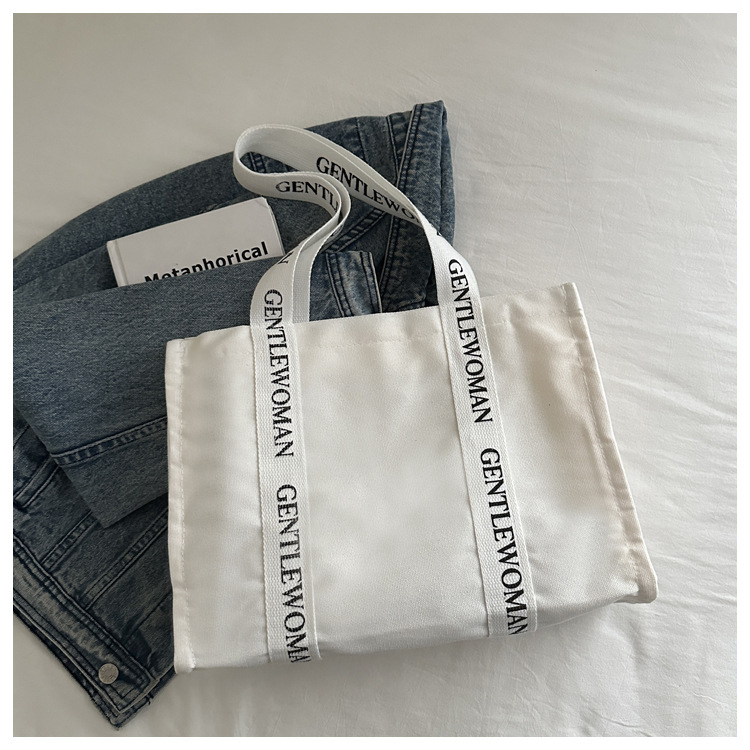 Large-capacity letter canvas bag 2025 new style ins printed versatile shoulder bag for commuting and portable ladies' tote bag undefined