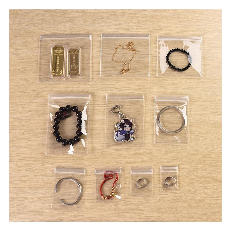 Joyería transparente Bolsa de joyería Pendientes de joyería Pendientes Anillo Pulsera Bolsa de embalaje anti-oxidación Bolsa sellada con PVC