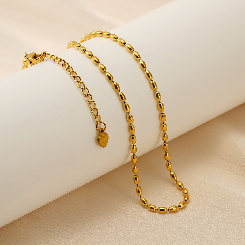 Collar de acero inoxidable de estilo europeo y americano chapado en oro de 18k simple collar de collar de acero de titanio de arroz elíptico para mujeres