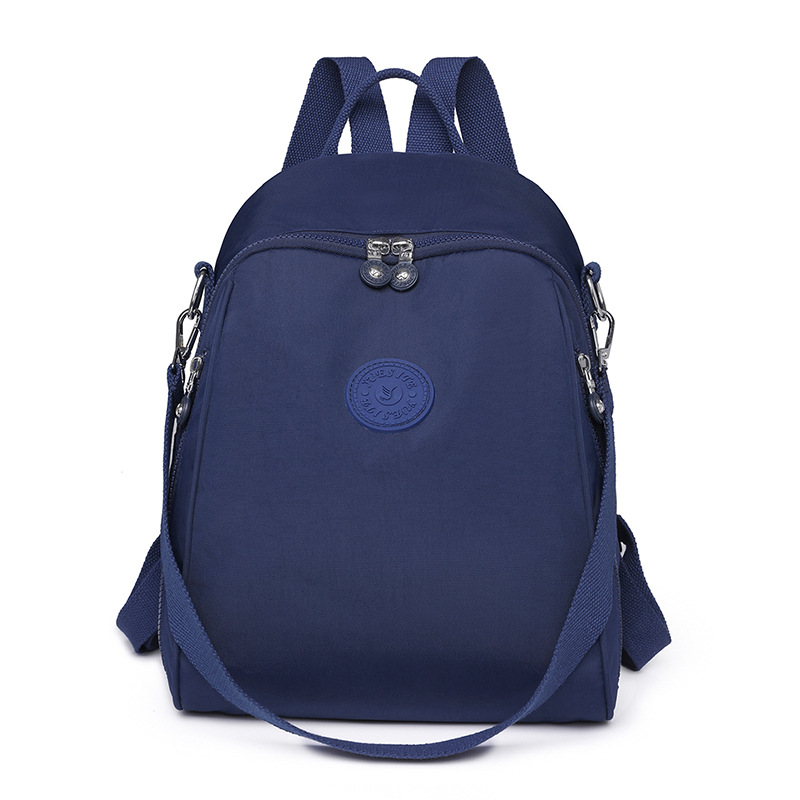 Mochila para mujer, mochila pequeña de tela Oxford de gran capacidad, resistente al agua, nueva mochila escolar de nailon lavanda de todo fósforo de moda