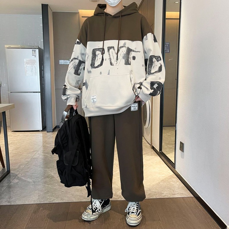 Los fabricantes de origen pueden personalizar el logotipo de los hombres jóvenes primavera y otoño moda suelta suéter con capucha suéter pantalones traje hombres