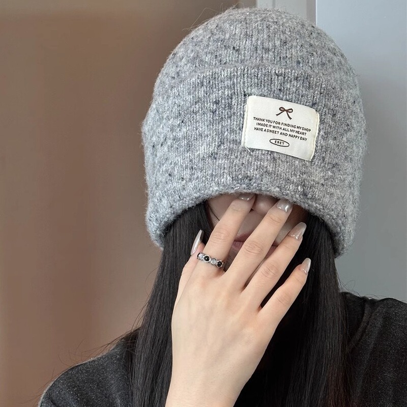 Colored dots with flower yarn wool knitted hat autumn and winter wool hat Korean ins bow patch cold hat women