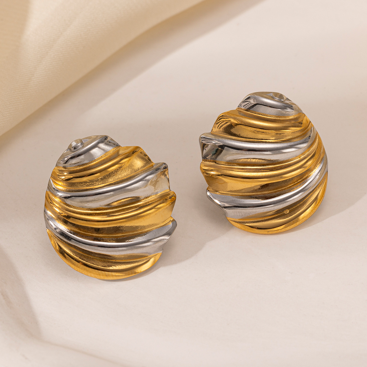 Taina auriculares de acero inoxidable lujosos de alto nivel, geometría minimalista, acero de titanio corrugado no se desvanece, auriculares transfronterizos europeos y estadounidenses