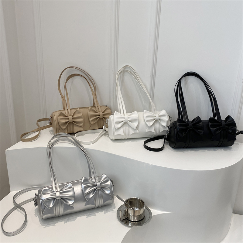 Bolsos debajo de las axilas de la mujer 2024 nuevo estilo de diseño de moda nicho bolso de arco bolso de mano