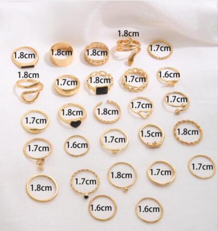 Europa y América transfronteriza nueva atmósfera creativa simple anillo de diamantes de perlas pendientes collar traje de oro al por mayor