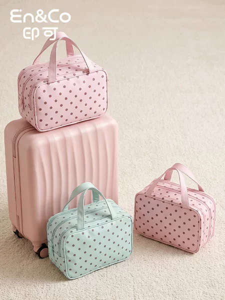 Simple polka dot three-layer makeup bag, with compartments for skincare products and cosmetics, a travel toiletry bag, and a business trip organizer