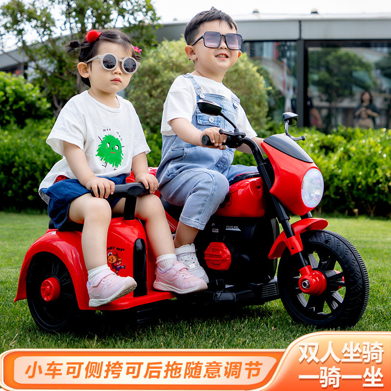 Nuevo triciclo eléctrico para niños para dos personas con mochila recargable y motocicleta de control remoto para niños
