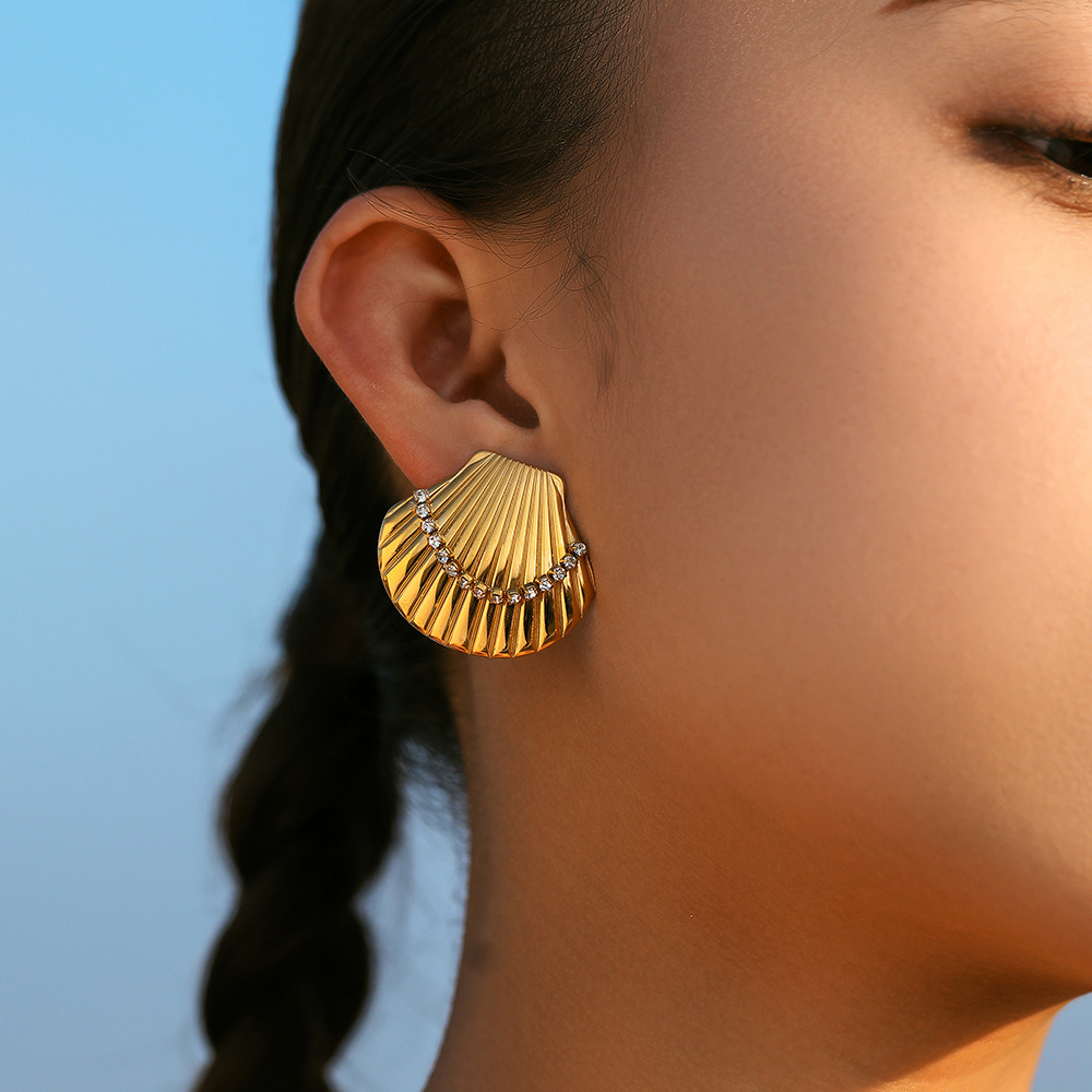 TENA europa y americana de acero inoxidable exagerado pendientes de nicho de alto nivel de diseño de conchas de mar de viento de titanio pendientes de acero joyas de orejas