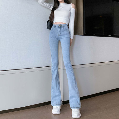 Light-colored denim jeans for women: high-waisted, slimming, slightly flared, figure-flattering, fish-tail style—versatile cropped pants.