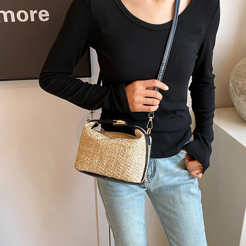Bolsa de vacaciones de paja de estilo de verano para mujeres, nuevo nicho de diseño de hombro, bolso de mano, bolso de vacaciones de playa