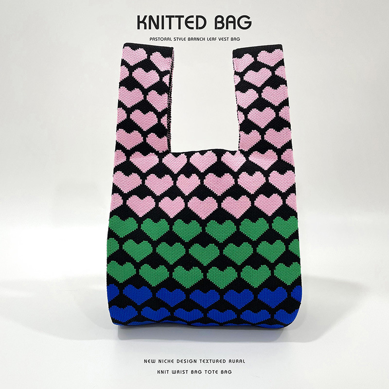 Diseño de nicho de tres colores Amor de punto hombro bolso de mano simple todo partido de gran capacidad bolso de mano al por mayor