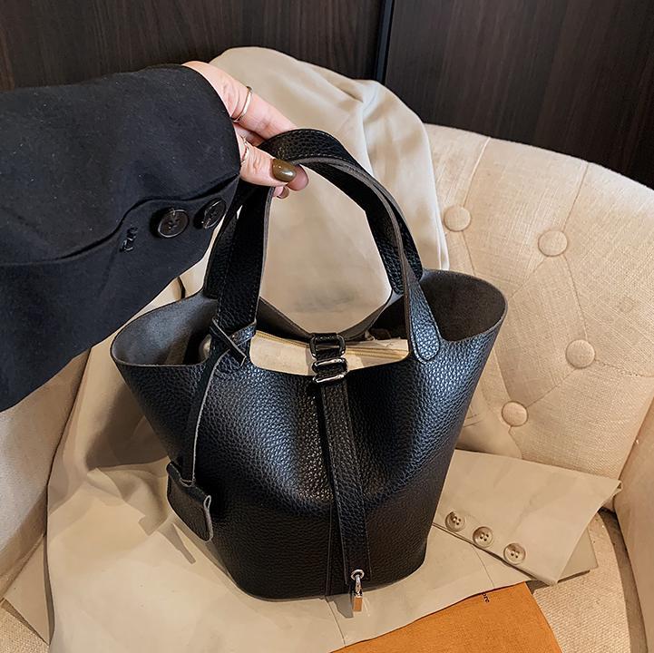 Bolsos de cesta de verduras de estilo caliente de comercio exterior para mujer 2025 nuevo bolso de cubo de ocio simple bolso femenino de alta gama de nicho