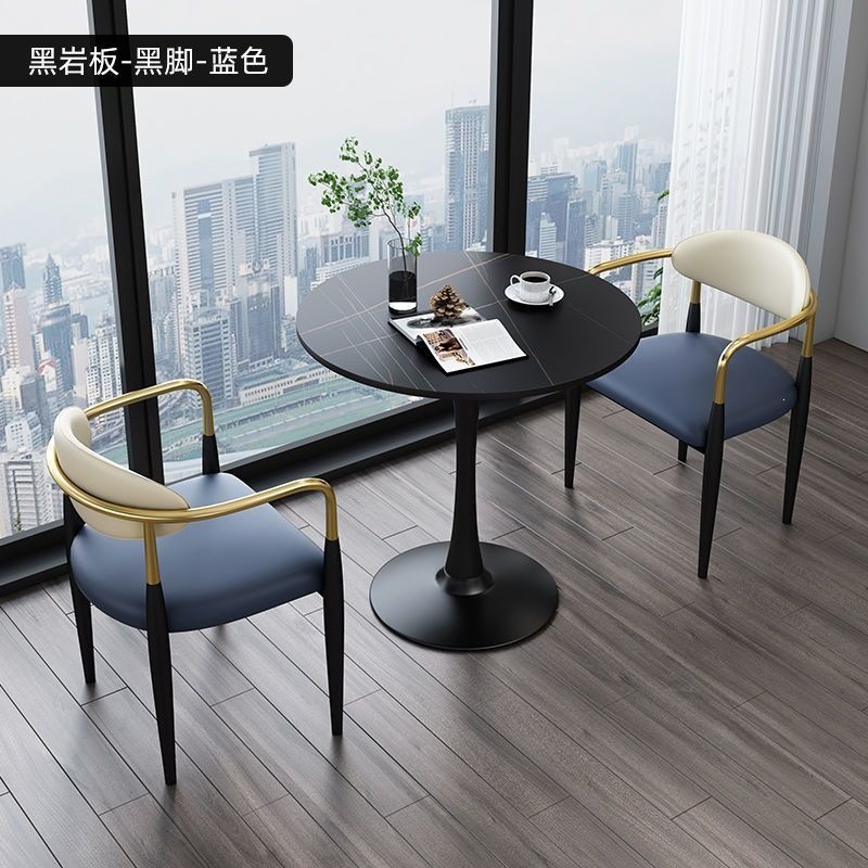 Black legs + black rock slab + blue leather, one table and two chairs