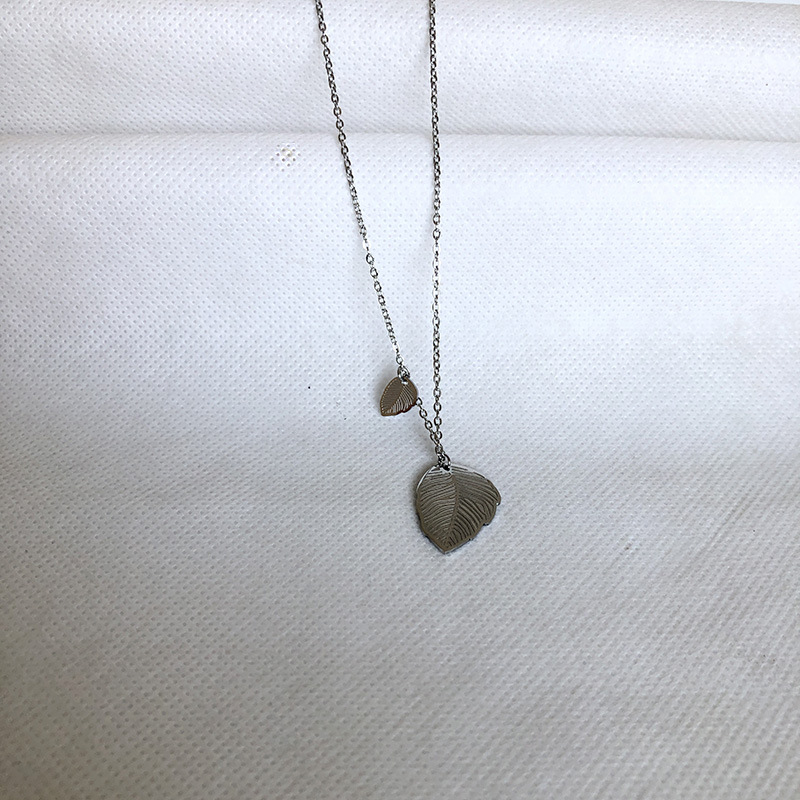 Joyería colgante transfronteriza al por mayor de acero inoxidable flor hoja ala forma colgante sin decoloración collar simple de las mujeres