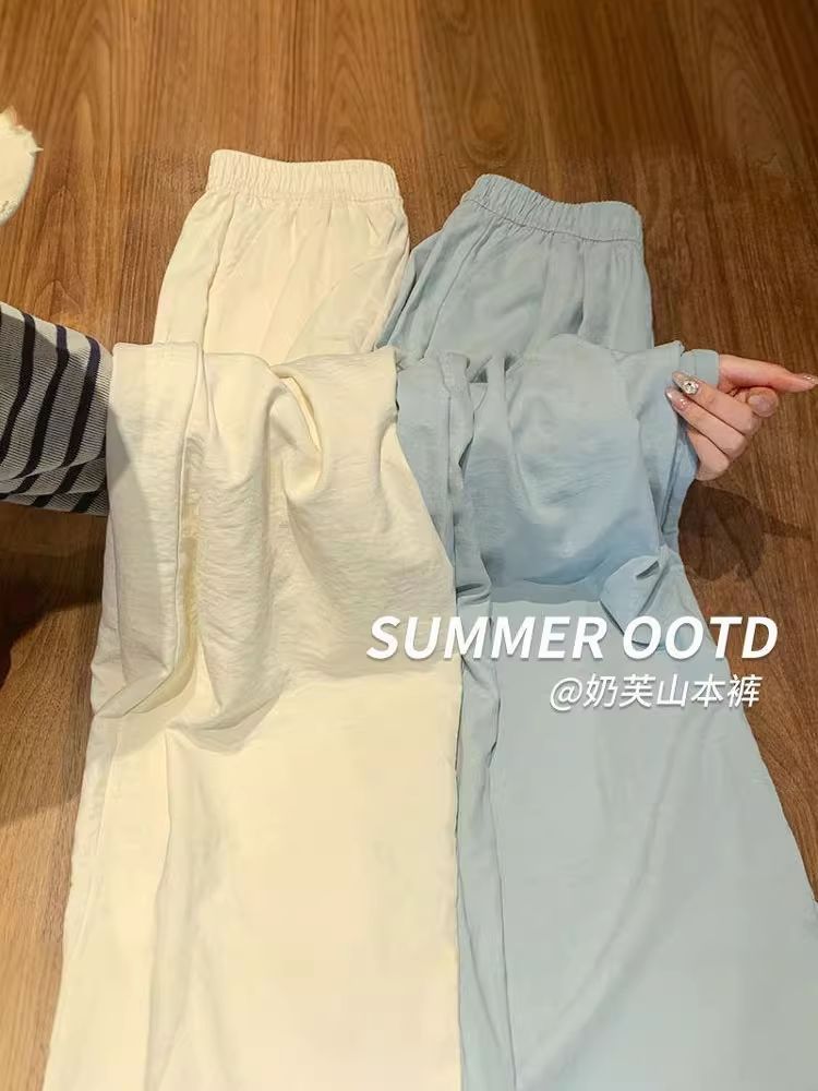 Pantalones Yamamoto de seda lechosa blanca para mujer, estilo fino de verano, nuevo modelo 2026, textura holgada y relajada, pantalones anchos de seda helada con caída.