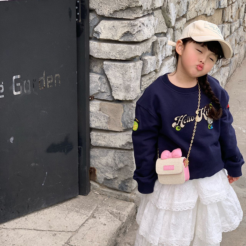 Bolso de hombro para niños y niñas de estilo coreano mini bolso de mensajero para niños con lazo lindo 2025 nuevo bolso de paja para niños