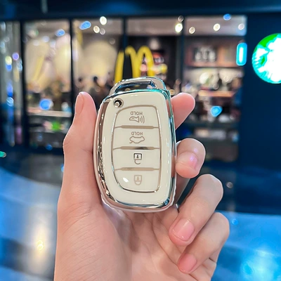 trade South Korea modern car interior — Car key bag - modern-q-model-smart-4-button-speaker-single-shell-white