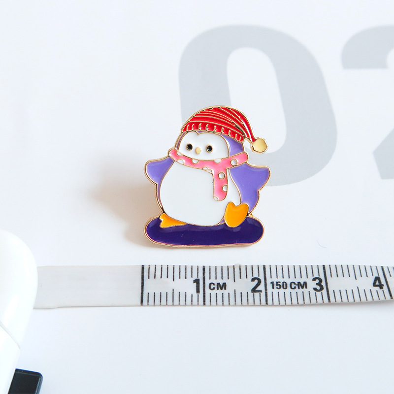 Spilla donna a forma di pinguino spilletta in metallo creativa_voghion.com