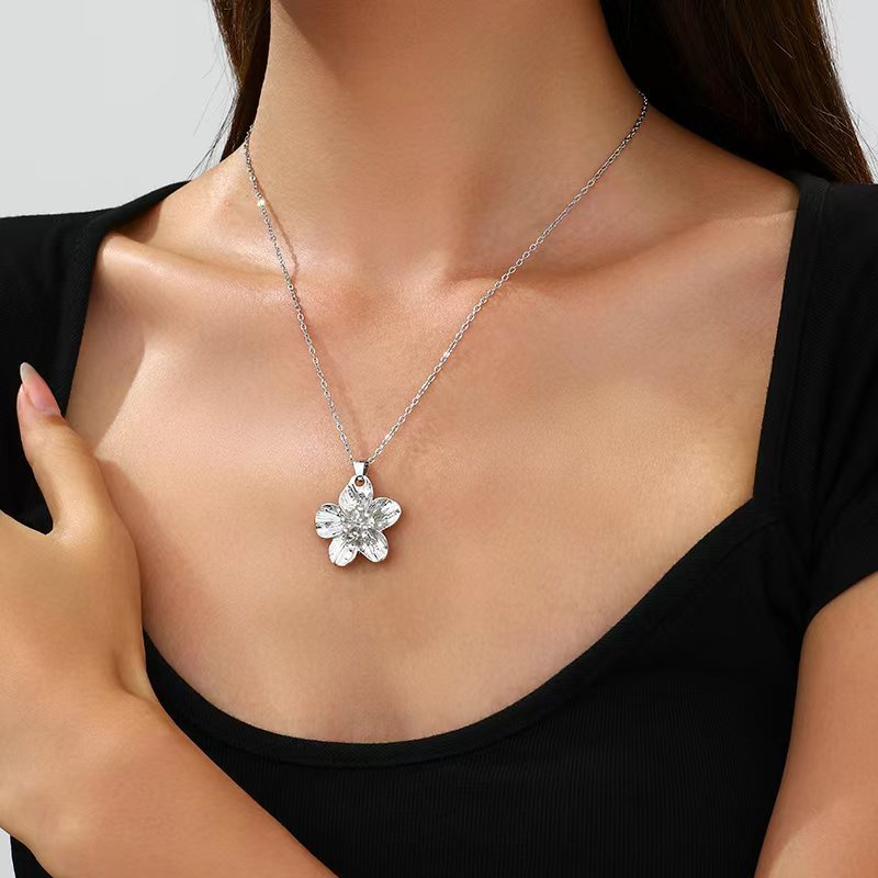 Europa y los Estados Unidos moda transfronteriza venta caliente flor simple personalidad universal mujer raqueta de calle conjunto de decoración joyas de moda
