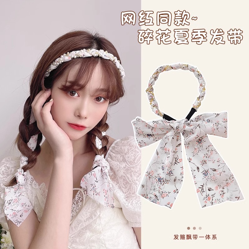 27 ¿ una cinta de flores rosas