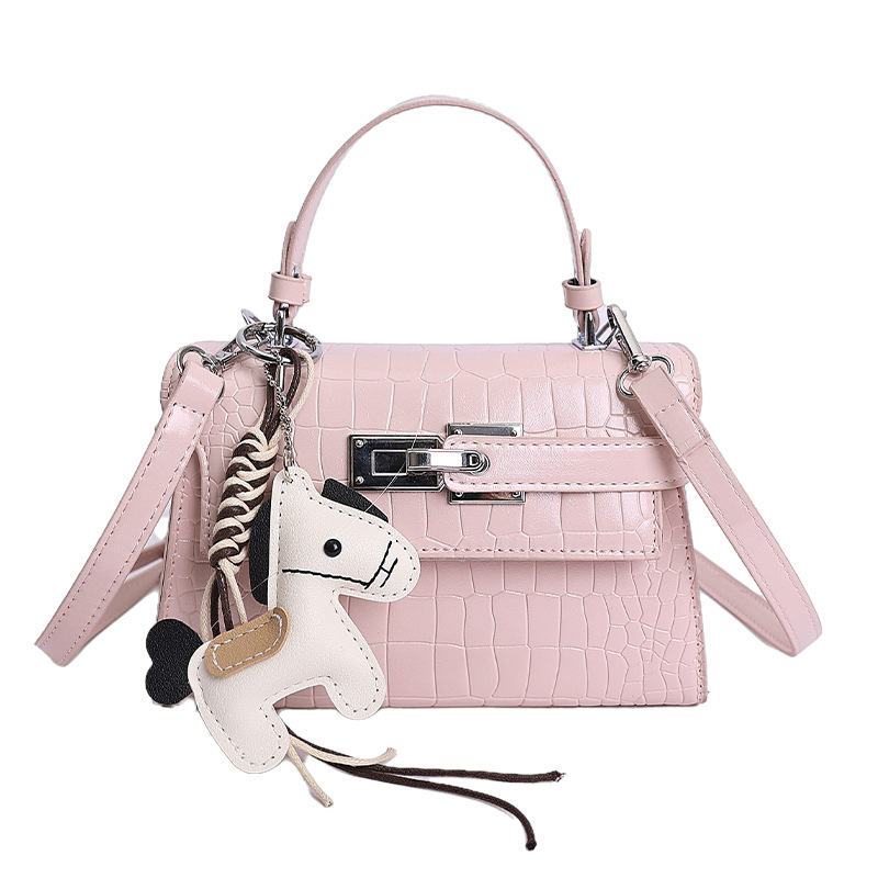 Bolsos de textura de nicho de cocodrilo de alta calidad, bolsos de mujer 2026 nuevos bolsos de mochila, bolsos de bloqueo de moda