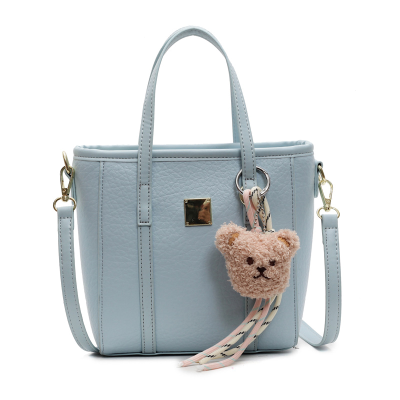 Bolsa de cubo de mano de comercio exterior para mujeres 2025 nuevo nicho de diseño exterior bolso de hombro de estilo universal bolso de mochila de moda casual