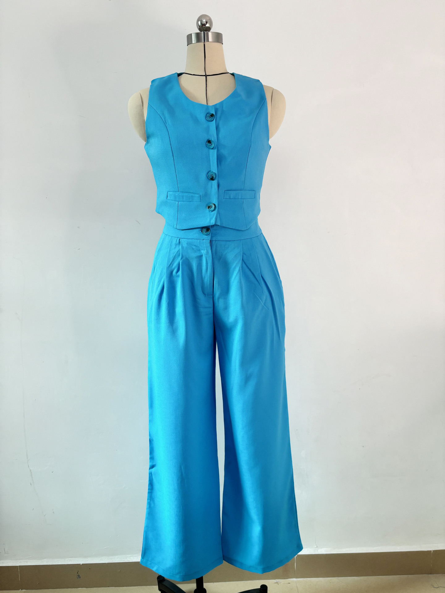 420g Weight Sleeveless Sleeve Length Spandex, Polyester Fabric Type Pant Co-ord Set Sets Type 2 Pieces Set Quantity Daily Occasion U Neck Neckline Regular Fit Fit Type Solid Color Pattern Summer Season Women's Gender Button Design Streetwear Style Daily Women's Streetwear Solid Color Spandex Polyester Button Pant Co-ord Set Pants Sets 1