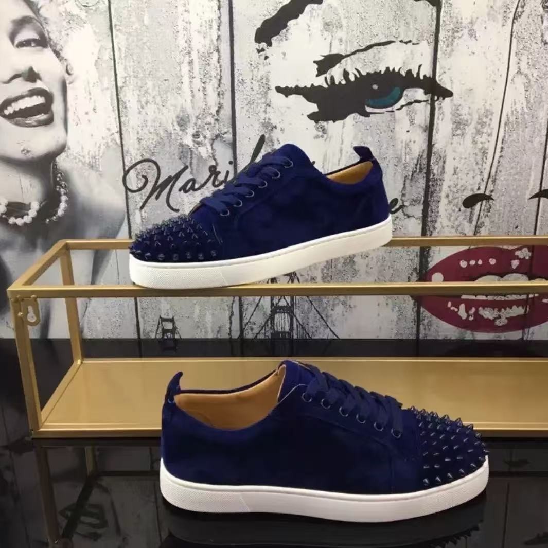 Estación europea cl remaches eléctricos zapatos de suela roja de tendencia universal remaches pareja de moda casual zapatos casuales de moda europea