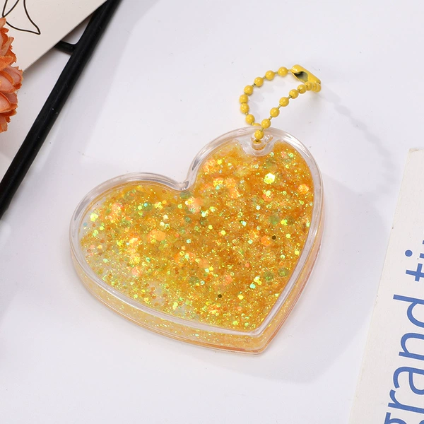 Yellow love flowing sand contains bead chains