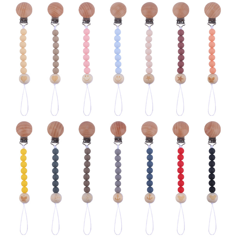 Nuevos suministros para bebés clip de chupete de haya creativo bebé DIY patrón de dibujos animados cuentas de madera Cadena de chupete cadena anti-caída