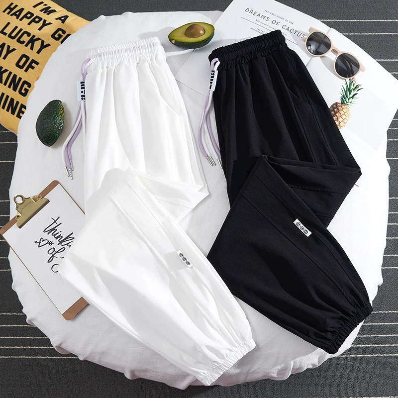 Ледяной шелк быстро сушить спортивные брюки для девочек весна и осень летом 2025 новый стиль средней школы повседневные тонкие брюки для старшеклассников