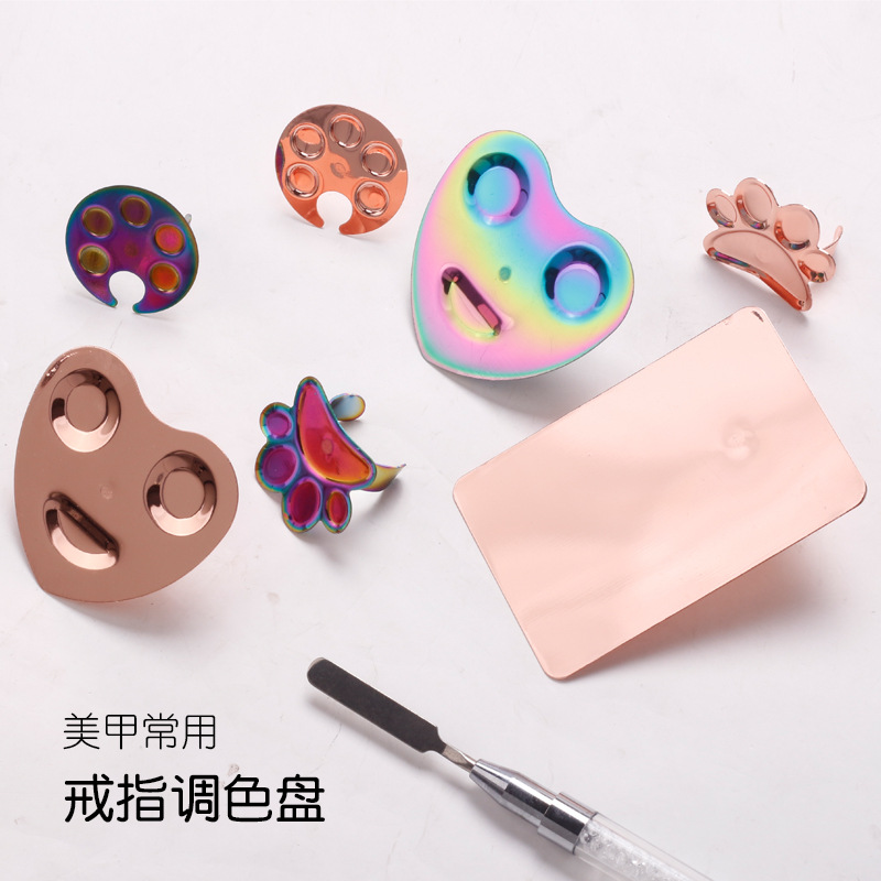 Venta caliente transfronteriza de uñas anillo de acero inoxidable paleta de color chapado en titanio multi-forma anillo de uñas tatuaje bordado pigmento placa