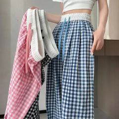 色の白黒の格子の広腿のズボンの女性のペンダント感がゆったりしています。