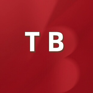 ��TB��