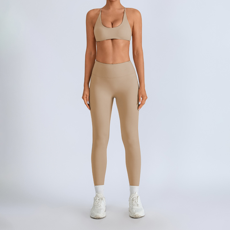Traje de yoga europeo y americano transfronterizo, espalda hermosa con almohadilla para el pecho, sujetador con tirantes cruzados, pantalones deportivos de secado rápido de melocotón de cintura alta