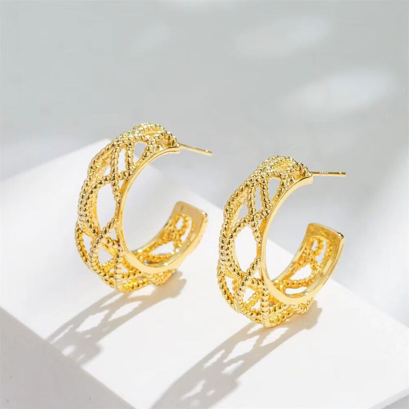 European and American Cross-border Stainless Steel 18K Gold Personality Geometric Hollow C- shaped Braided Winding Earrings INS Niche Advanced Sense