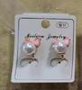 Fashionable cute ear clips, fuchsia earrings with bow from pearl, no pierced ears
