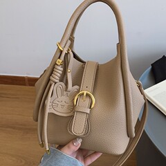 トップ層牛革バスケットバケツバッグ女性シングル肩斜めショルダーハンドバッグ女性通勤バッグ高級感レディースバッグ