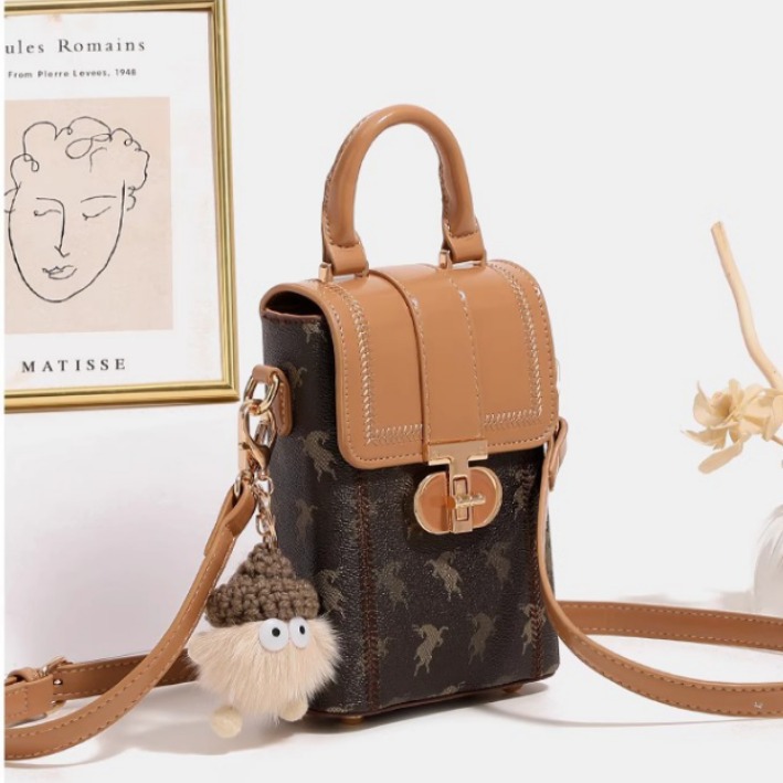 Otoño y invierno mini bolso de mujer 2026 nuevo nicho de hombro pequeño bolso de hombro de alto nivel bolso de mano pequeño bolso de teléfono móvil